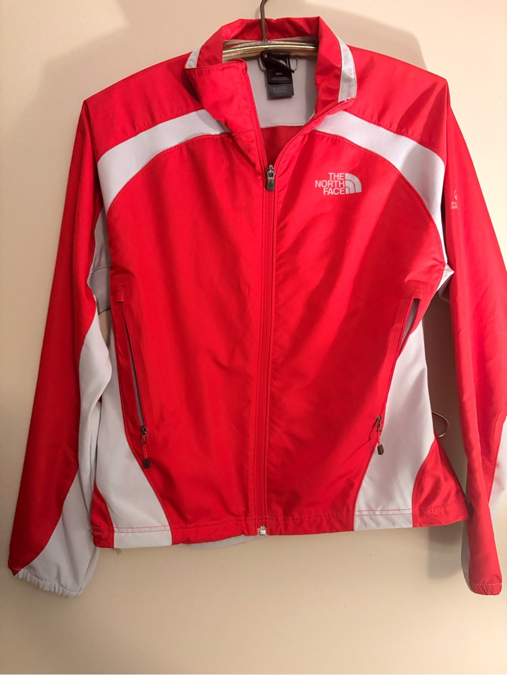 The North Face Flight Series red and gray windbreaker jacket women’s medium